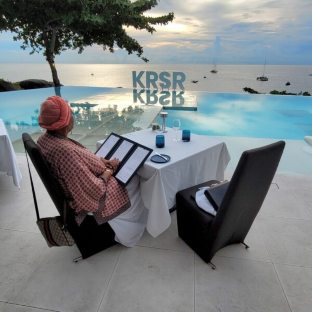 Woman dining poolside
